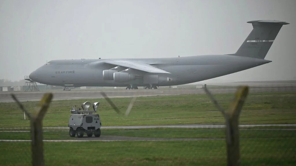 A US Air Force C-5 Galaxy sits on the runway at RAF Fairford in southwest England shortly after sunrise on 7 March 2026 (AFP)