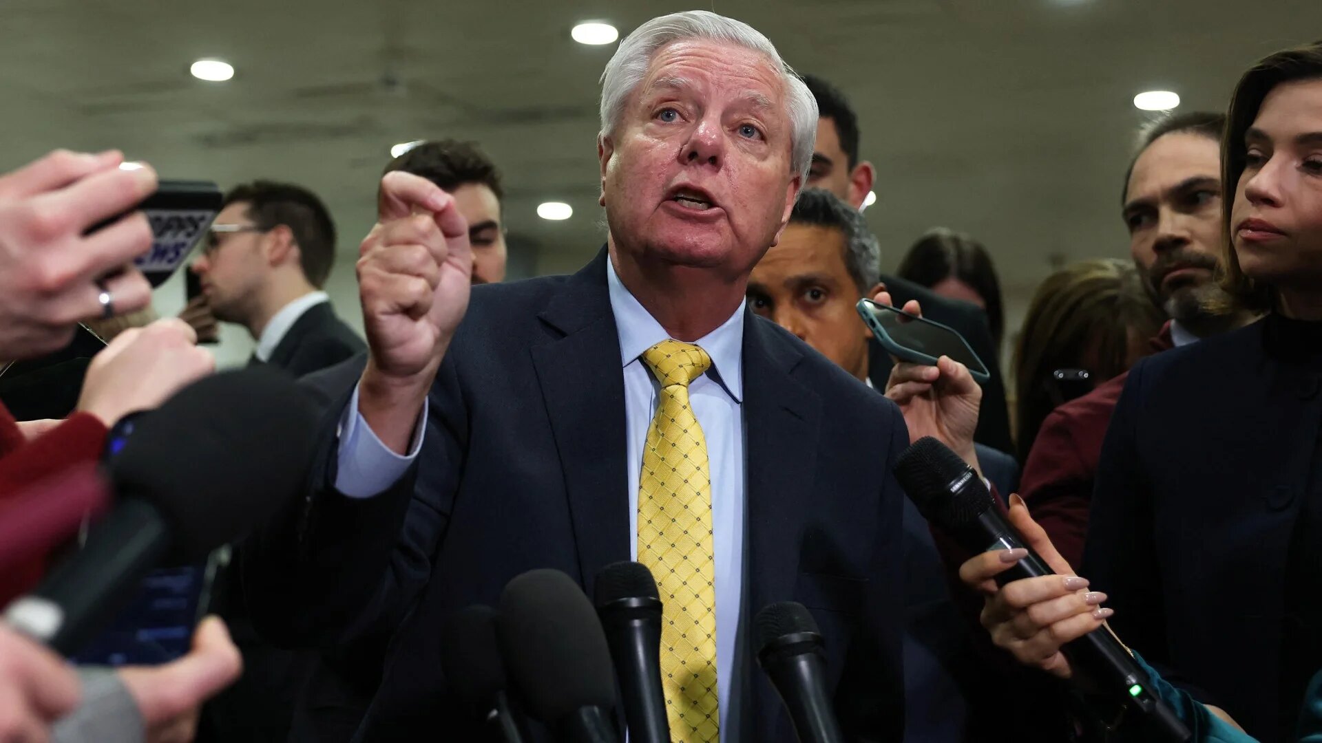 US Senator Lindsey Graham speaks to members of the media as the Trump Cabinet briefs members of Congress on Iran at the US Capitol on 3 March 2026 in Washington, DC (Anna Moneymaker/Getty Images North America/Getty Images via AFP)