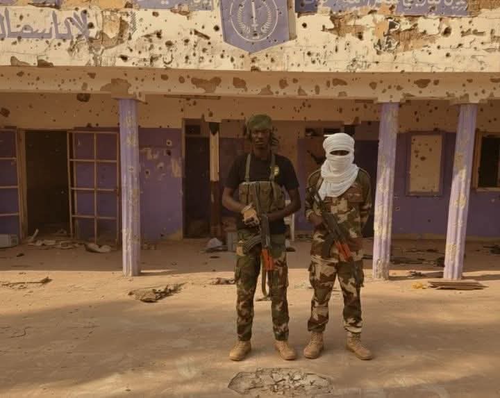 A photo provided to MEE by Joint Forces soldiers shows two soldiers in the Sixth Infantry garrison, allegedly taken on 26 October after the RSF took the base (supplied)