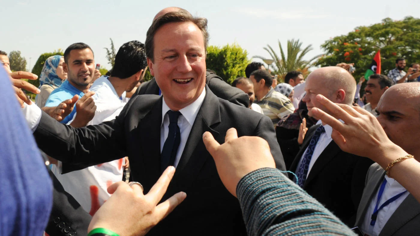 Britain's Prime Minister David Cameron meets patients and staff at the Tripoli Medical Centre, Tripoli, Libya on 15 September 2011 (AFP)