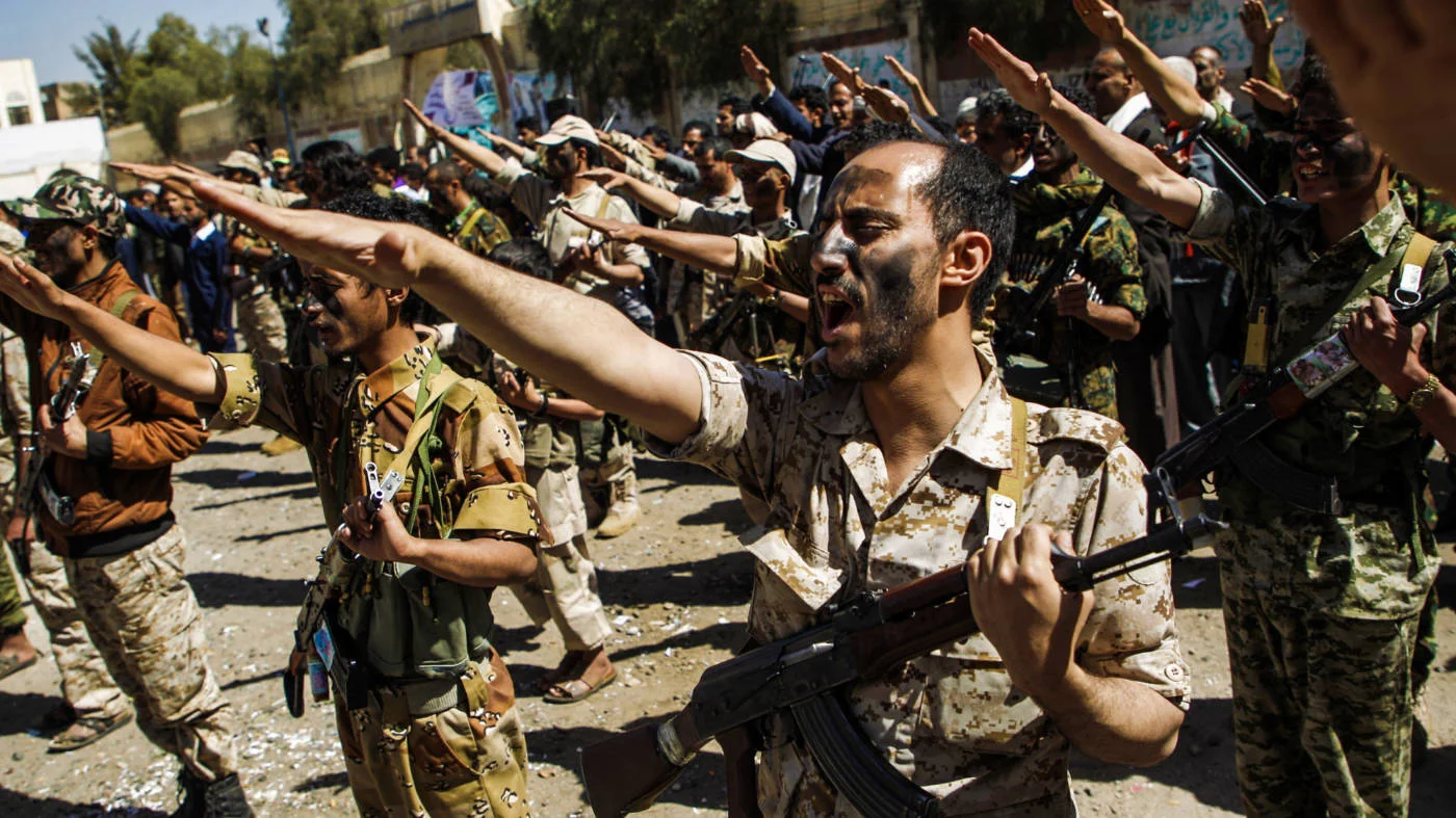 Newly recruited Houthi fighters chant slogans in Sanaa on 2 February 2017 (AFP)